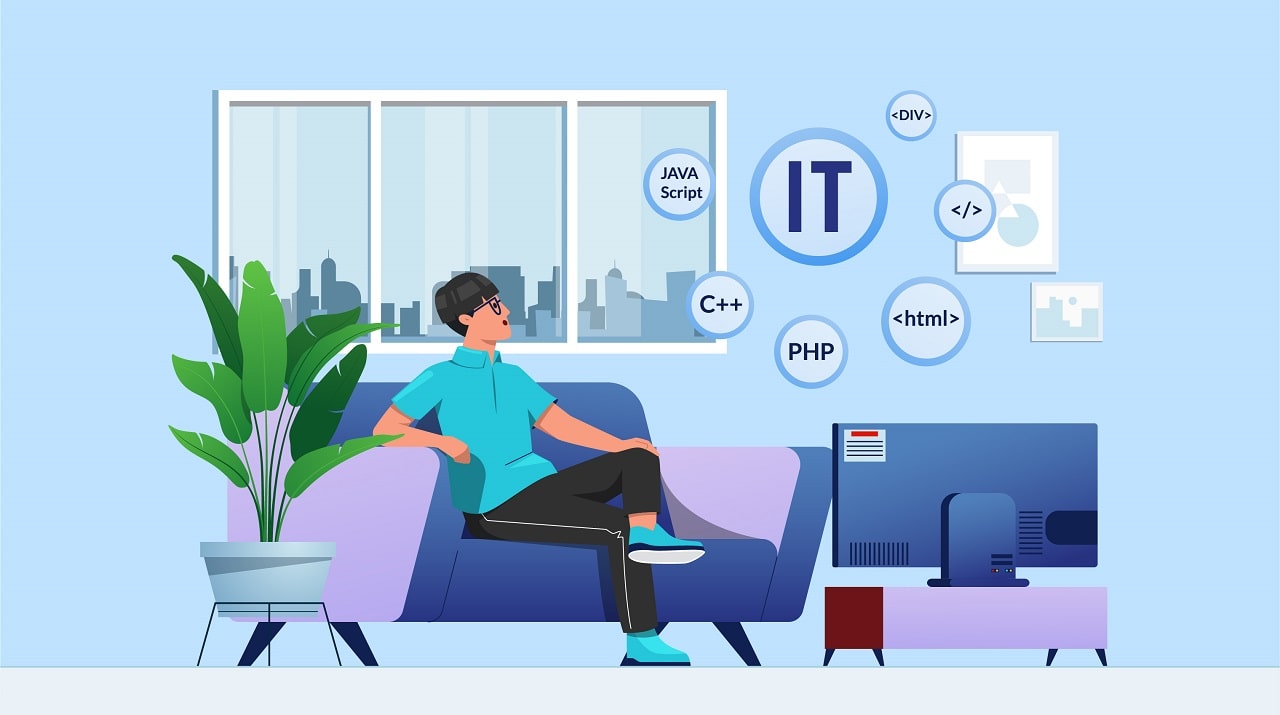 A man in a blue shirt is sitting at home on his couch thinking about the various IT career paths he could pursue.